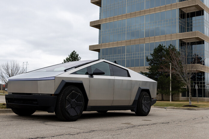 Tesla Cybertrucks sit in a parking lot at the corner of West 108th Street and Mastin Street in Overland Park on Saturday, March 15.