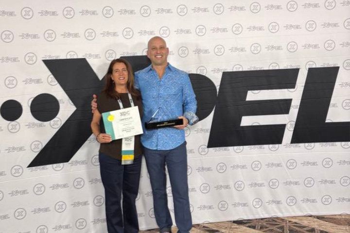 Liz Stewart accepts the XPEL award.