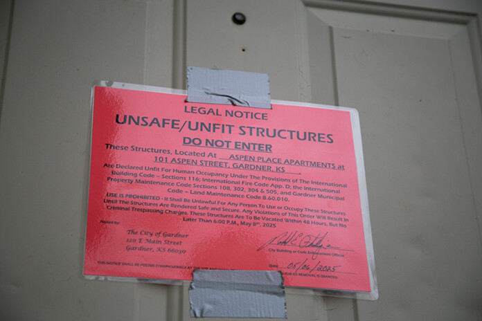 Legal notices like this one forbid entry to all housing units and deem them “unsafe/unfit structures.” Tenants must vacate their homes by 6 p.m. Thursday, May 8.