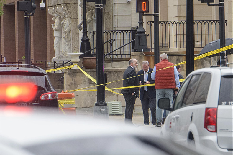 Law enforcement work the scene after two staff members of the Israeli Embassy in Washington were shot and killed outside the Capital Jewish Museum, Thursday, May 22, 2025, in Washington. One of the victims, Sarah Milgrim, was originally from Prairie Village, Kansas.