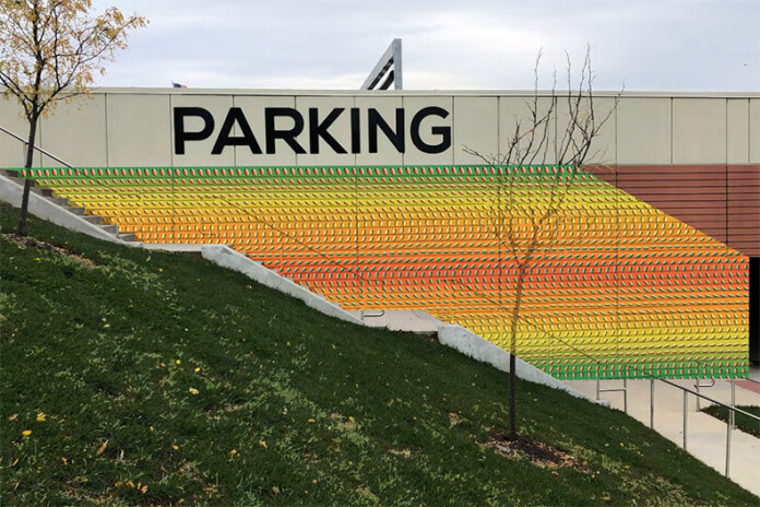 Merriam $50 mural at the community center parking structure