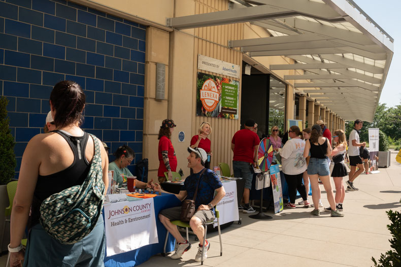 Tables for the Juneteenth celebration are lined up outside of the Lenexa City Center Library.