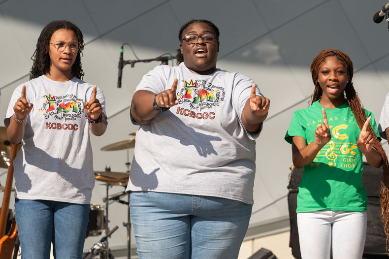 From left, Victoria Whyte, Sydney Ramsey and Ta-Yon McCoy perform with the Kansas City Boys and Girls Choir. The choir is an acclaimed ensemble which has performed in Washington, D.C. and alongside Leslie Odom Jr.