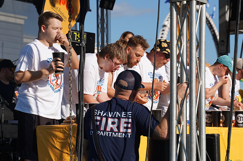 Hundreds watch Nathan’s Famous Hot Dog Eating Contest Qualifier at Old Shawnee Days. 