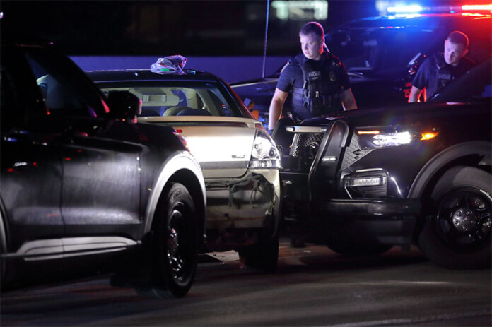 A suspect's vehicle pinned in after a standoff on I-35 in Johnson County.