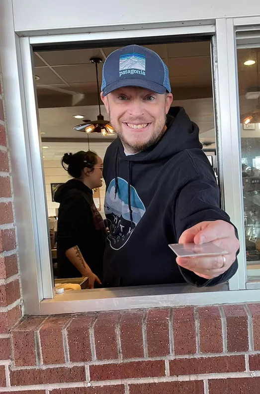 Keith Davenport, owner of Groundhouse Coffee, practiced his drive-thru skills at the Gardner Road location last year after purchasing the business from longtime owners Beth and Steve Hines.