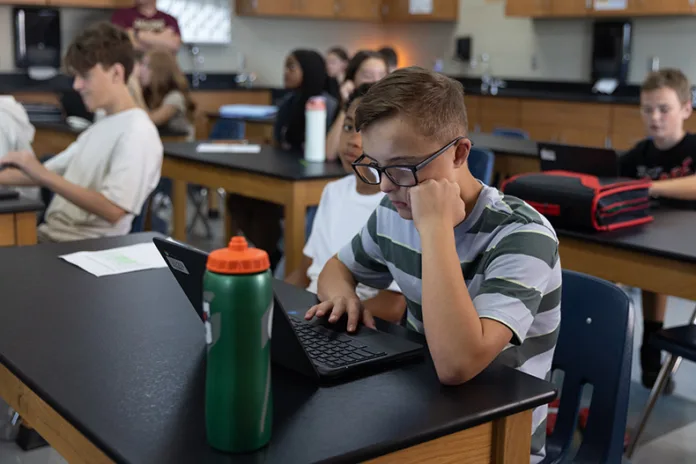 A student works on his Chromebook in Connor Koesser’s eighth-grade science class at Pioneer Ridge Middle School on Aug. 13.