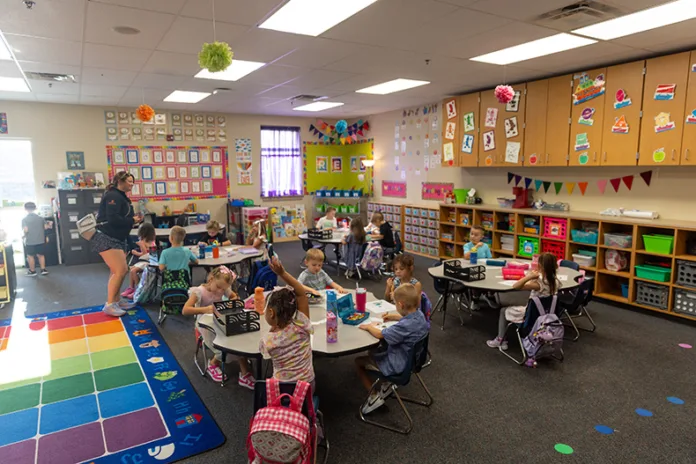 Kindergarten students in Natalie Nelson’s class color their welcome packets on the morning of Aug. 13.