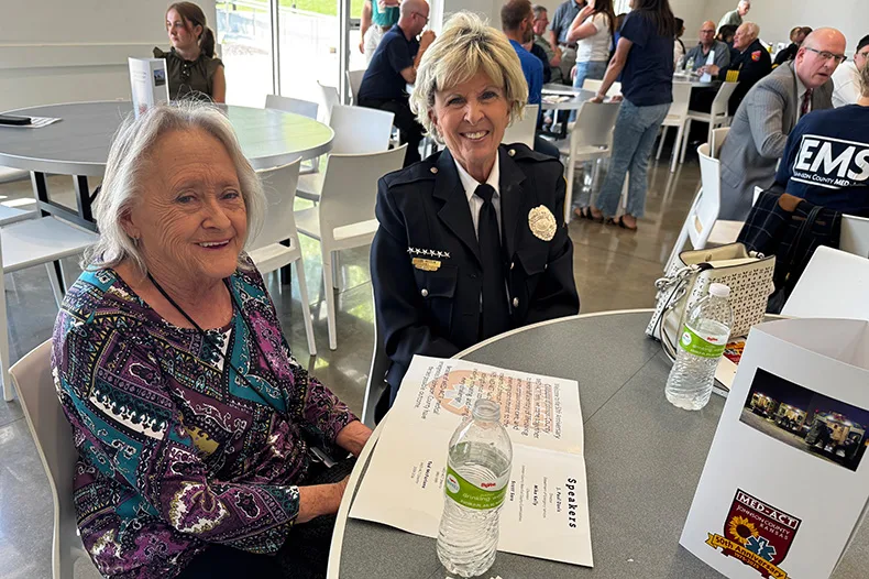 Retired team leader Sue Crawford (left), who currently works in the Med-Act business office, and retired EMT Lori Bristow.