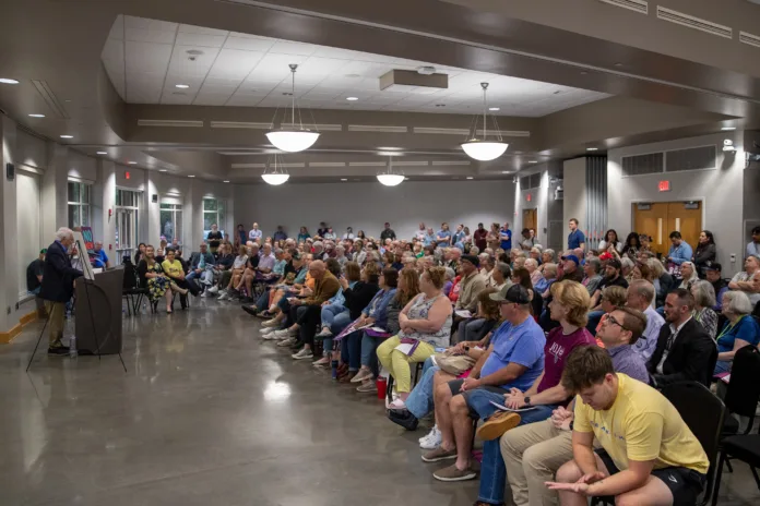 More than 200 people gathered on Tuesday, Oct. 14, at Sylvester Powell Community Center in Mission for a rally to voice opposition against Kansas Republicans' recent efforts to launch a special session focused on redistricting.