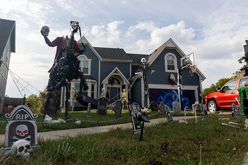 A headless horseman and gravestones cover the yard of a home in the cul de sac off of South Greenwood and West 129th Terrace in Olathe.