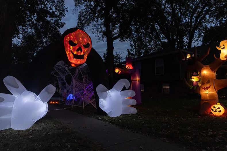 An inflatable skeleton covers the sidewalk outside of a home near Windsor Drive and West 87th Street in Overland Park.