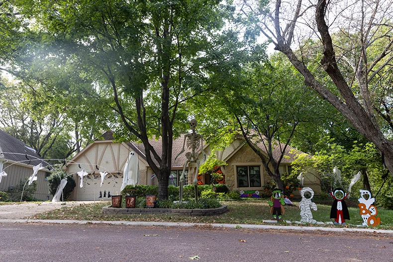A house is decked out with Halloween decorations near Hemlock Street and West 116th Street in Overland Park.
