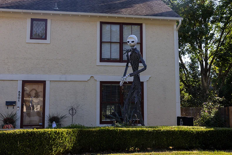 A Jack Skellington figure from “The Nightmare Before Christmas” stands outside of a home on the corner of Nall Avenue and West 90th Terrace in Overland Park.