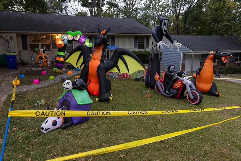 Inflatables of all sizes are seen on the front lawn of a home on the corner of Lamar Avenue and West 81st Street in Overland Park.