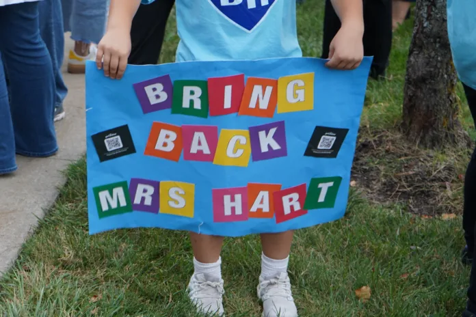 A homemade sign reads 