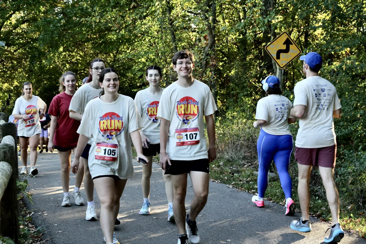 A group of people walking.