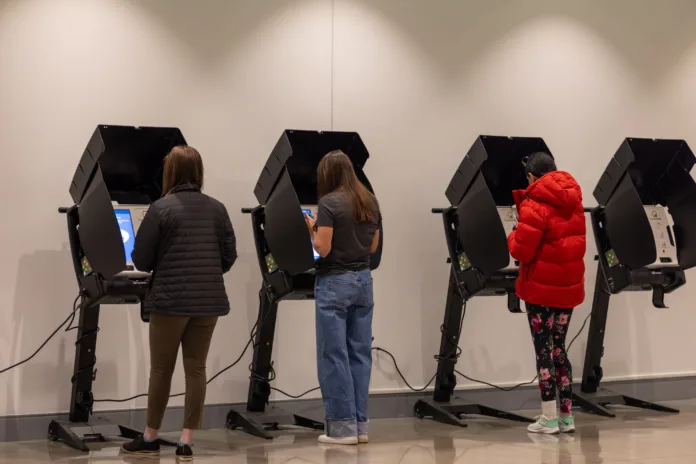 Voters cast their ballots on Election Day at the Johnson County Arts & Heritage Center in Overland Park.