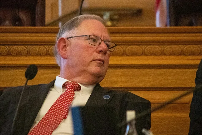 Kansas House Speaker Dan Hawkins, a Republican, demoted seven lawmakers for failing to toe the party line on redistricting.