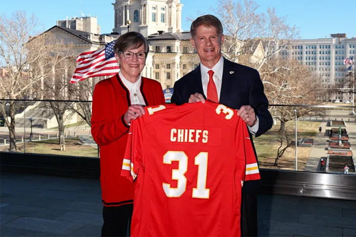 Kansas Gov. Laura Kelly and Chiefs owner Clark Hunt in Topeka on Monday, Dec. 22, announcing the team's move to Kansas. The 