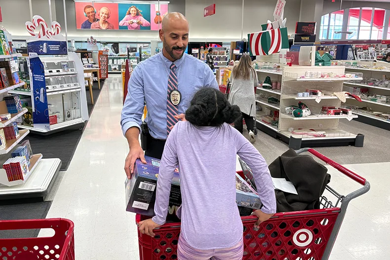 Prairie Village officers helped local children pick out gifts for the holiday season during its 2025 Shop with a PV Cop event. Photo courtesy Prairie Village Police Department.