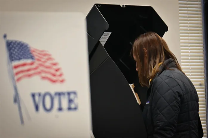 Voters in Kansas City, Kansas, showing up at the Wyandotte County Election office for the last minutes of early voting on Nov. 7, 2022.