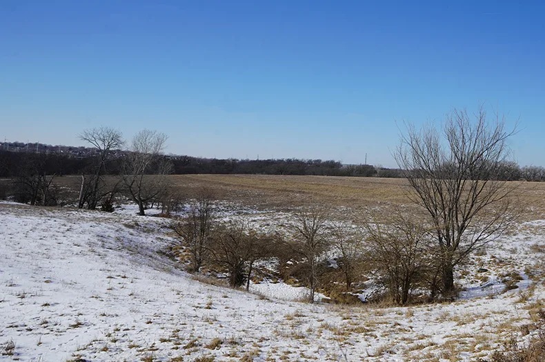 An empty field with snow.