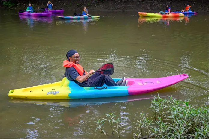 Heartland Conservation Alliance conservation project manager Damon Patterson kayaks near the Brown Recreation Area Boat Ramp last spring.