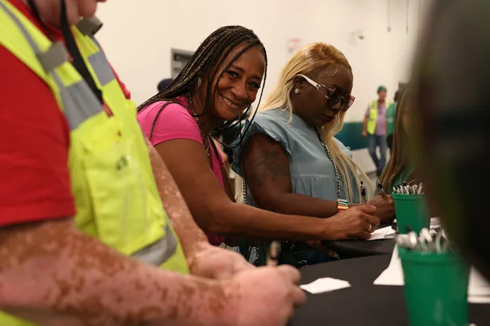 Panasonic workers at the plant's employee grand opening in summer 2025.