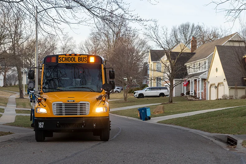 A DS Bus Line bus drives down Bradshaw Street in Lenexa on Thursday, Feb. 19.
