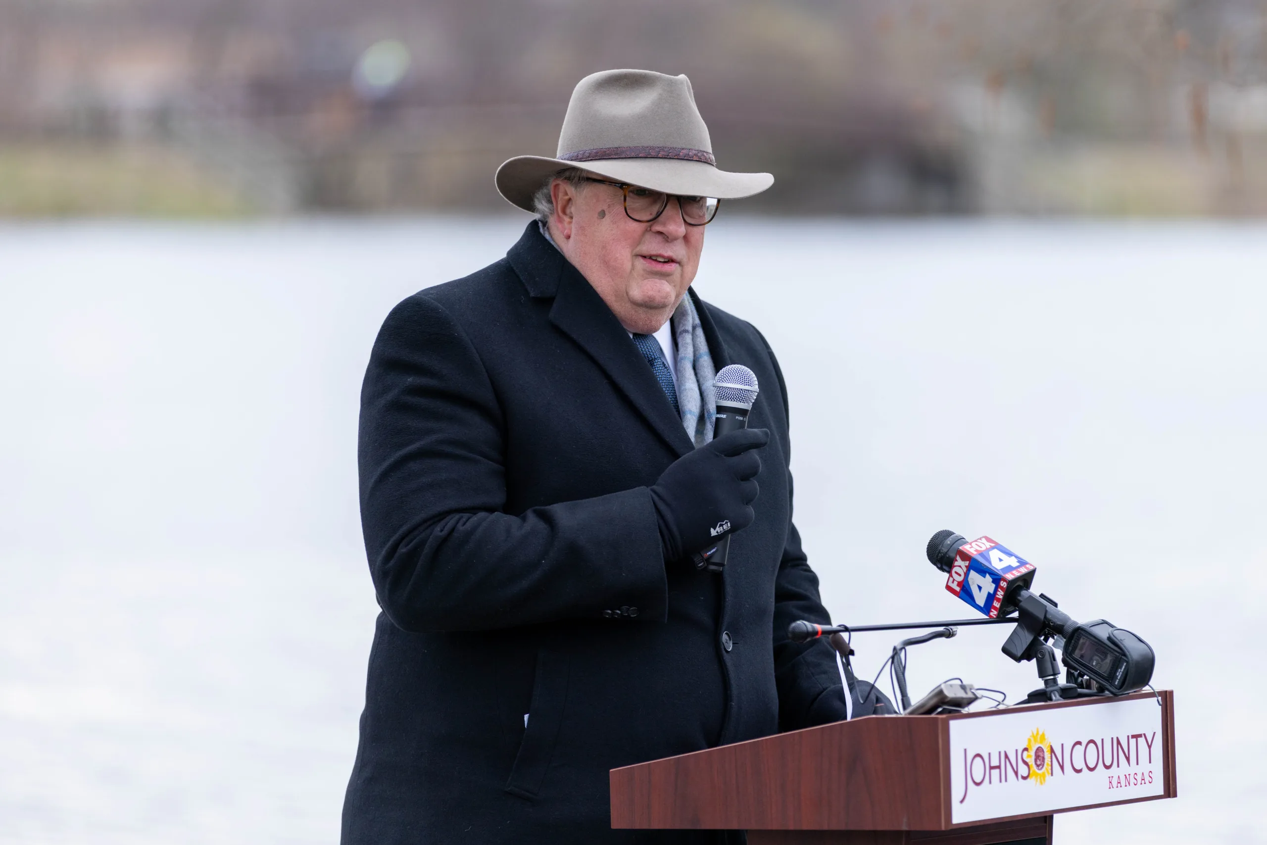 Leawood Mayor Marc Elkins speaks during a ceremony honoring the new historical signage for Negro Creek at Kingston Lake Park on Friday, March 27.