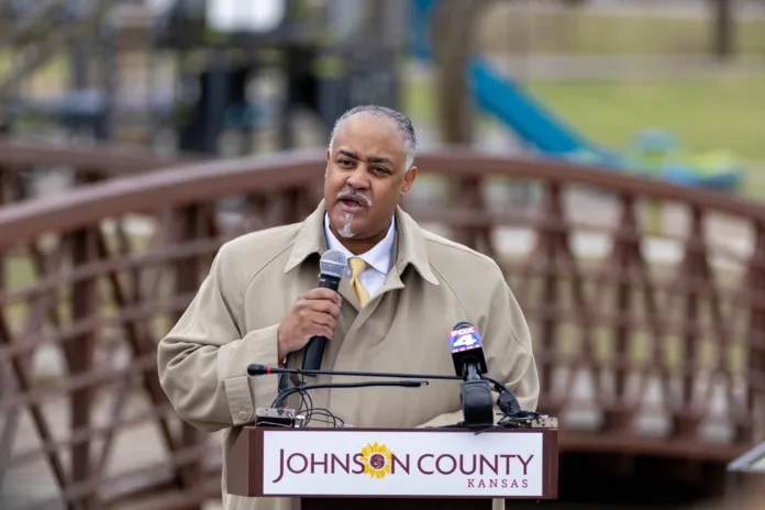 Mark McCormick, director of development for Miracle of Innocence and a member of the Kansas African American Affairs Commission, speaks during the ceremony honoring the new historical signage for Negro Creek at Kingston Lake Park on Friday, March 27.