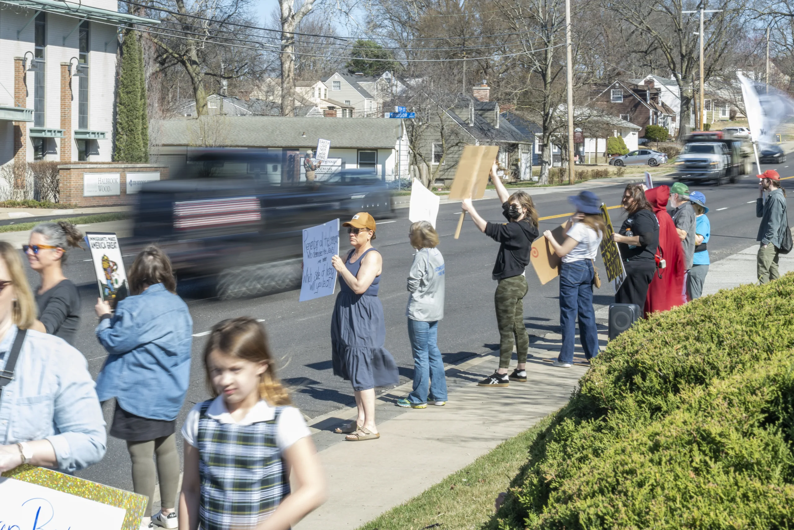 Protesters said their purpose was to raise awareness of Flint's efforts to sell property to the federal government, as well as pressure the company to end such deals. Photo credit Finn Bedell. 