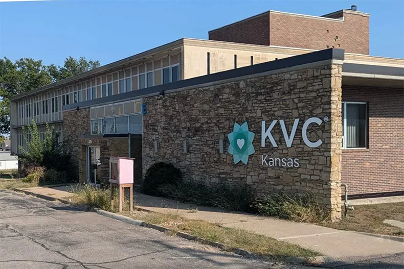 Foster care agency KVC Kansas proposed changing a state law that's forcing foster families to choose between adopting and keeping their foster care license.