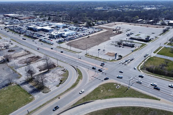 An aerial view of several recently demolished properties on the southeast corner of I-35 and Santa Fe Drive in Olathe. Photo credit Mike Frizzell.