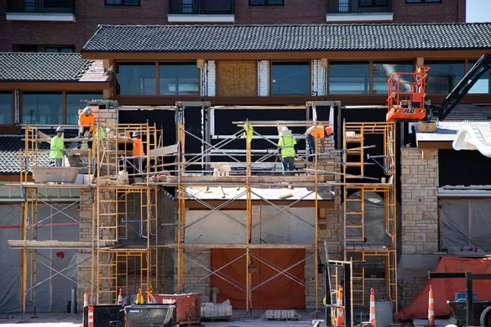 Crews continue to work on Clock Tower Landing and the new farmers' market pavilion in downtown Overland Park.