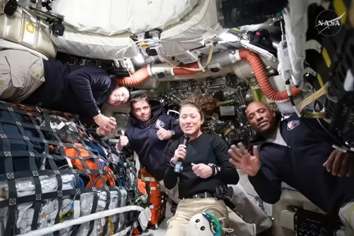 The Artemis II crew inside the Orion spacecraft as they took questions from reporters on April 6, 2026. Photo credit Shutterstock.