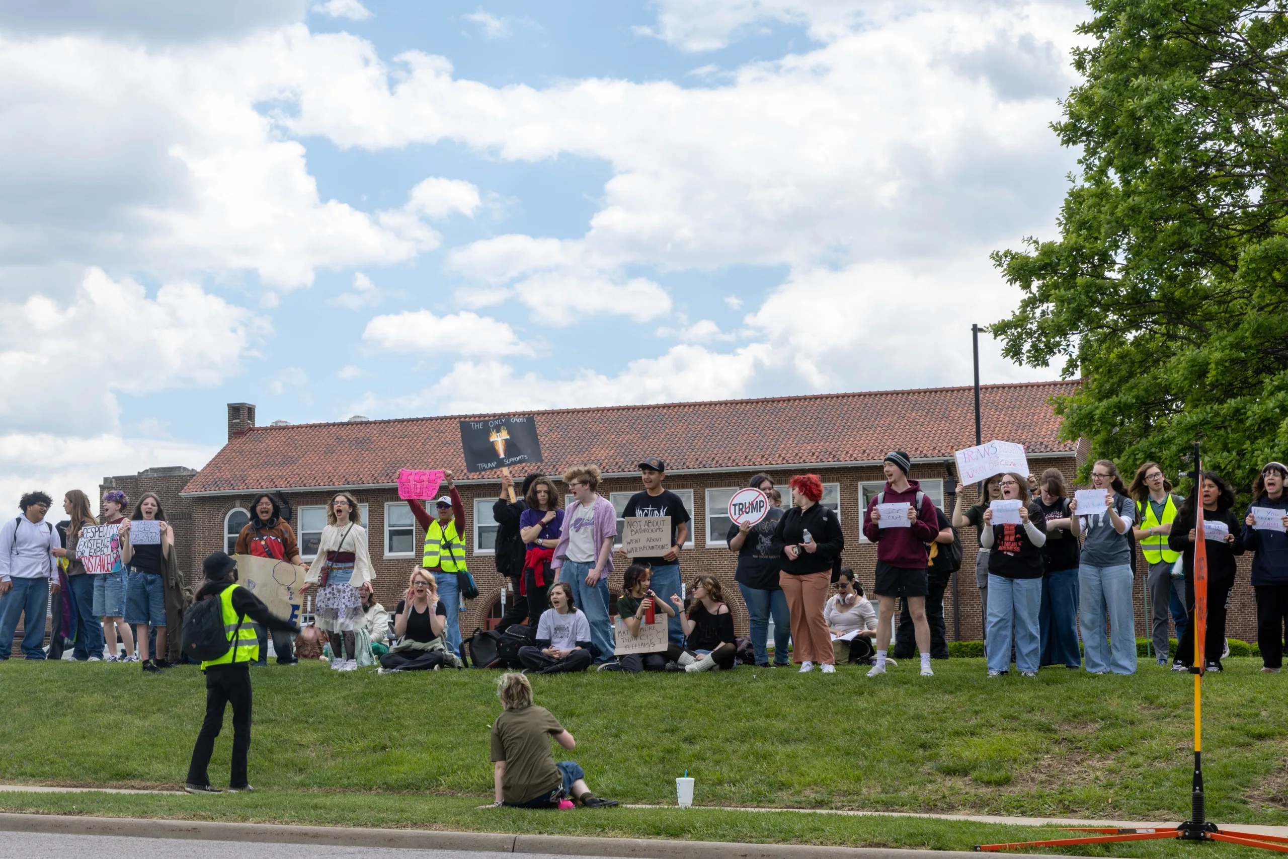 Shawnee Mission North High School students protest on the front lawn after marching to and from Broadmoor Park on Friday, May 1st. Photo credit Kylie Graham.