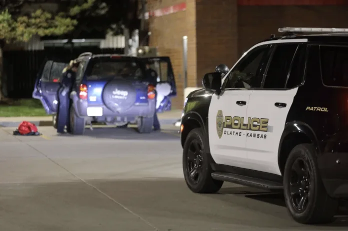 Woman arrested after man stabbed outside Olathe QuikTrip