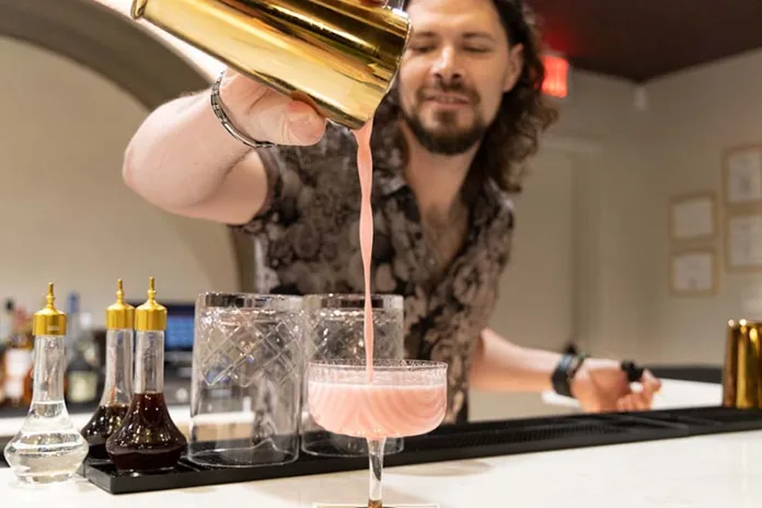 Overland Park boutique hides a speakeasy behind a pink curtain
