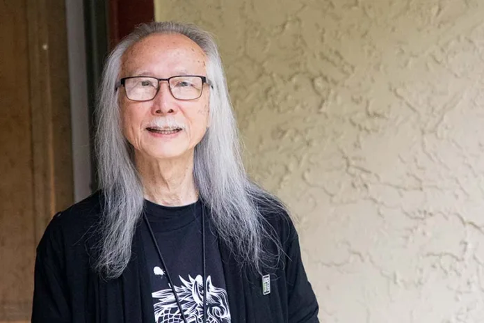 Kar Woo at his former family home in Overland Park, which he converted into a sober living community for adult men.