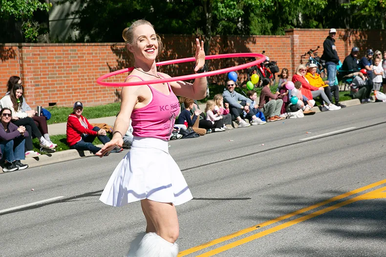 KC Hoop Girl, a hoola hooping company in Kansas City, performed down Mission Road, too. Photo credit Juliana Garcia. 