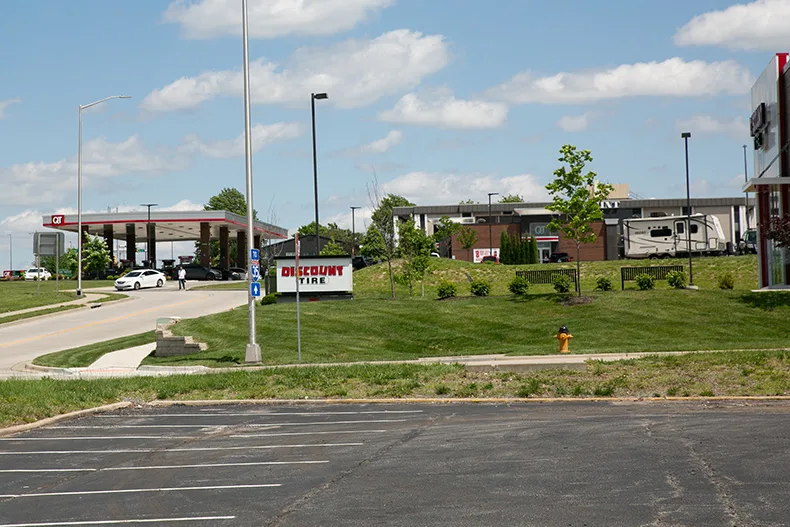 A view of the 95th Street QuikTrip in Lenexa near Discount Tire from the Radisson parking lot, all of which were part of the Aug. 6, 2023, incident that resulted in the killing of Ofc. Jonah Oswald. Photo credit Juliana Garcia.