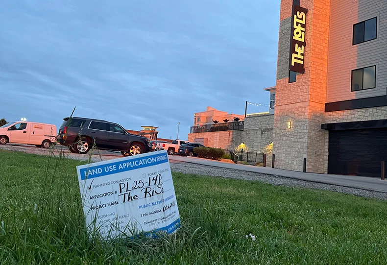 Sign for The Rise development in Lenexa City Center