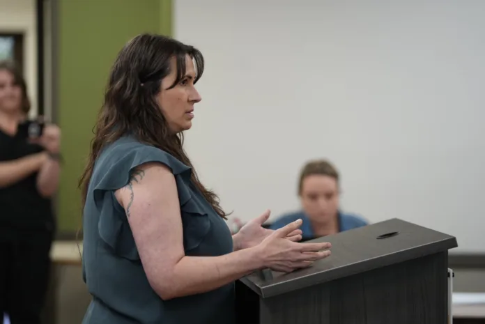 Edgerton resident Kim Twente speaks against data centers, and in favor of an extended moratorium, during the public comment at Thursday night's Edgerton City Council meeting.