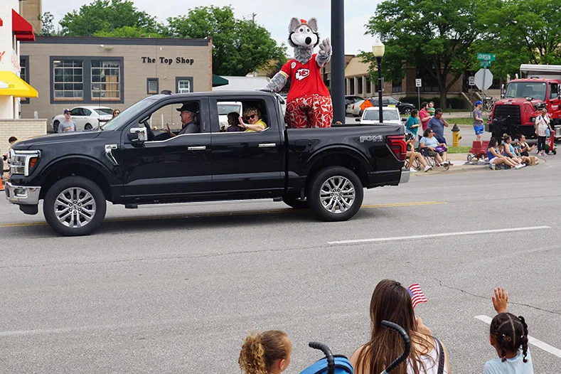 KC Wolf waves to the crowd. Photo credit Andrew Gaug.