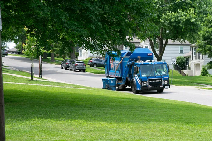 A Republic Services waste truck in Prairie Village in early June. Photo credit Juliana Garcia.