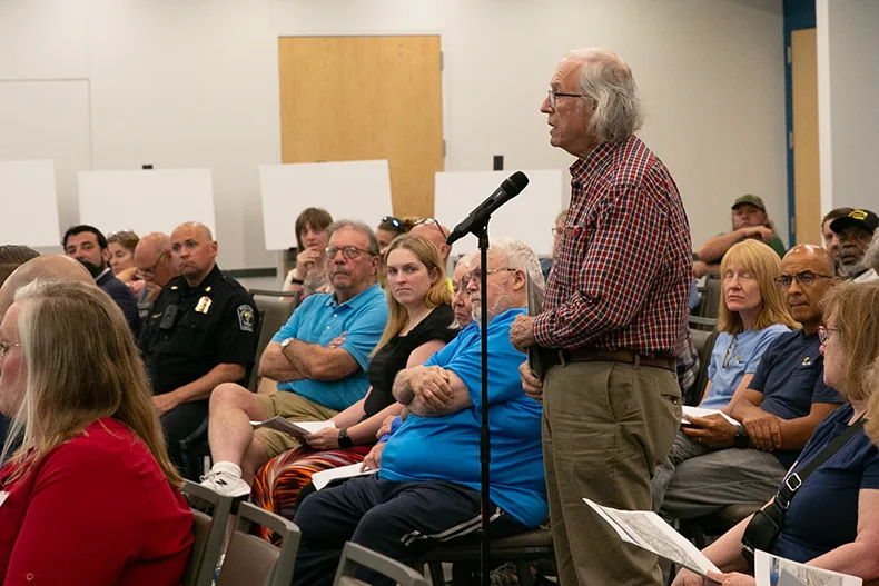 Rick Williams, a downtown Merriam business owner, gives public comment to the city council on June 8. Photo credit Juliana Garcia.
