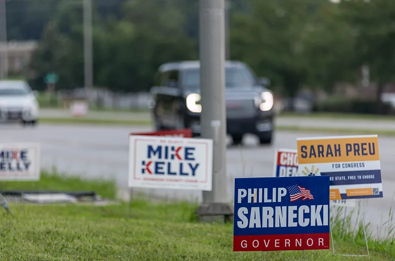 Campaign signs for candidates running for seats to represent some or all of Johnson County at 89th and Metcalf in Overland Park.