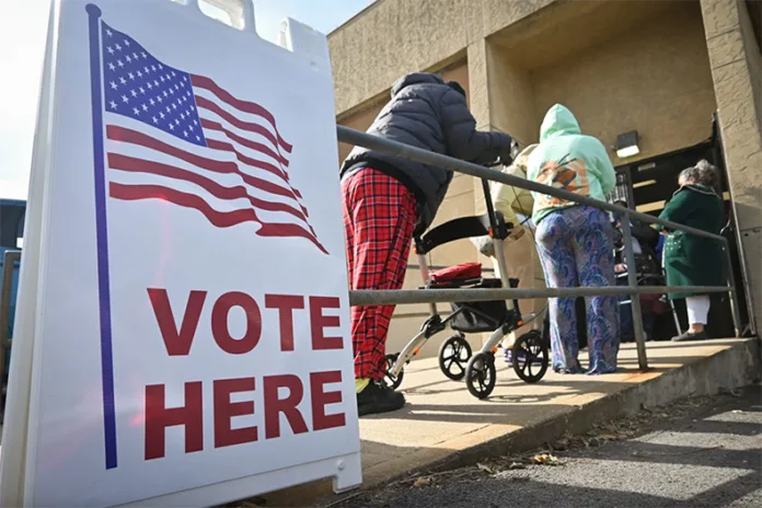 Voters in Kansas City, Kansas, showing up at the Wyandotte County Election office for the last minutes of early voting on Nov. 7, 2022.